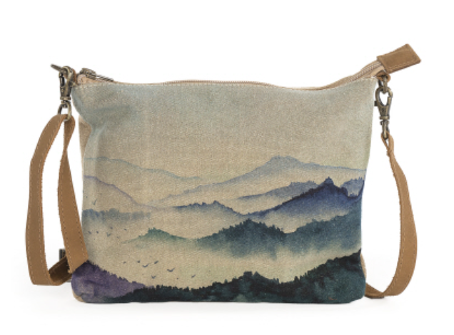 Mountain scene sling canvas bag with long removable strap. Leather trim, zipper and pockets Blue hills