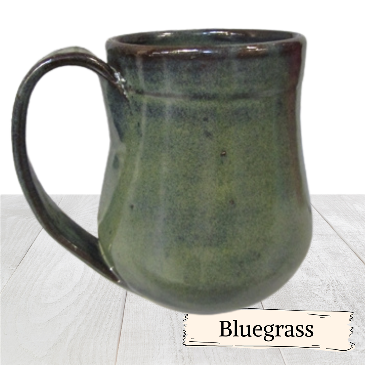 Coffee mug handmade pottery cup holds 12 ounces. Short ceramic tea cup