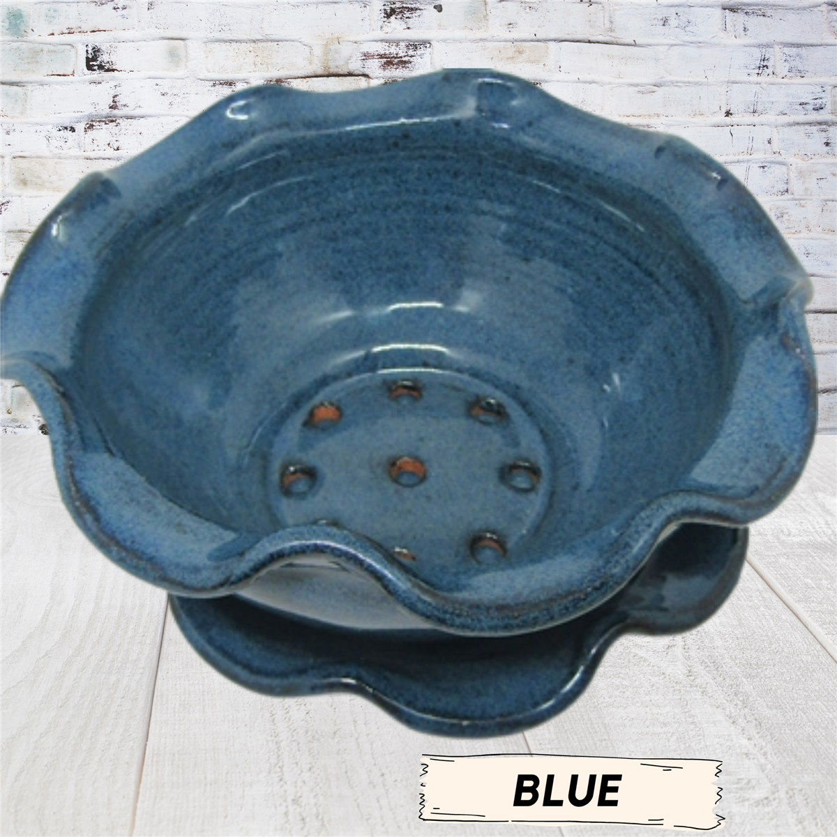 Colander strainer for draining blueberries pottery ceramic bowl