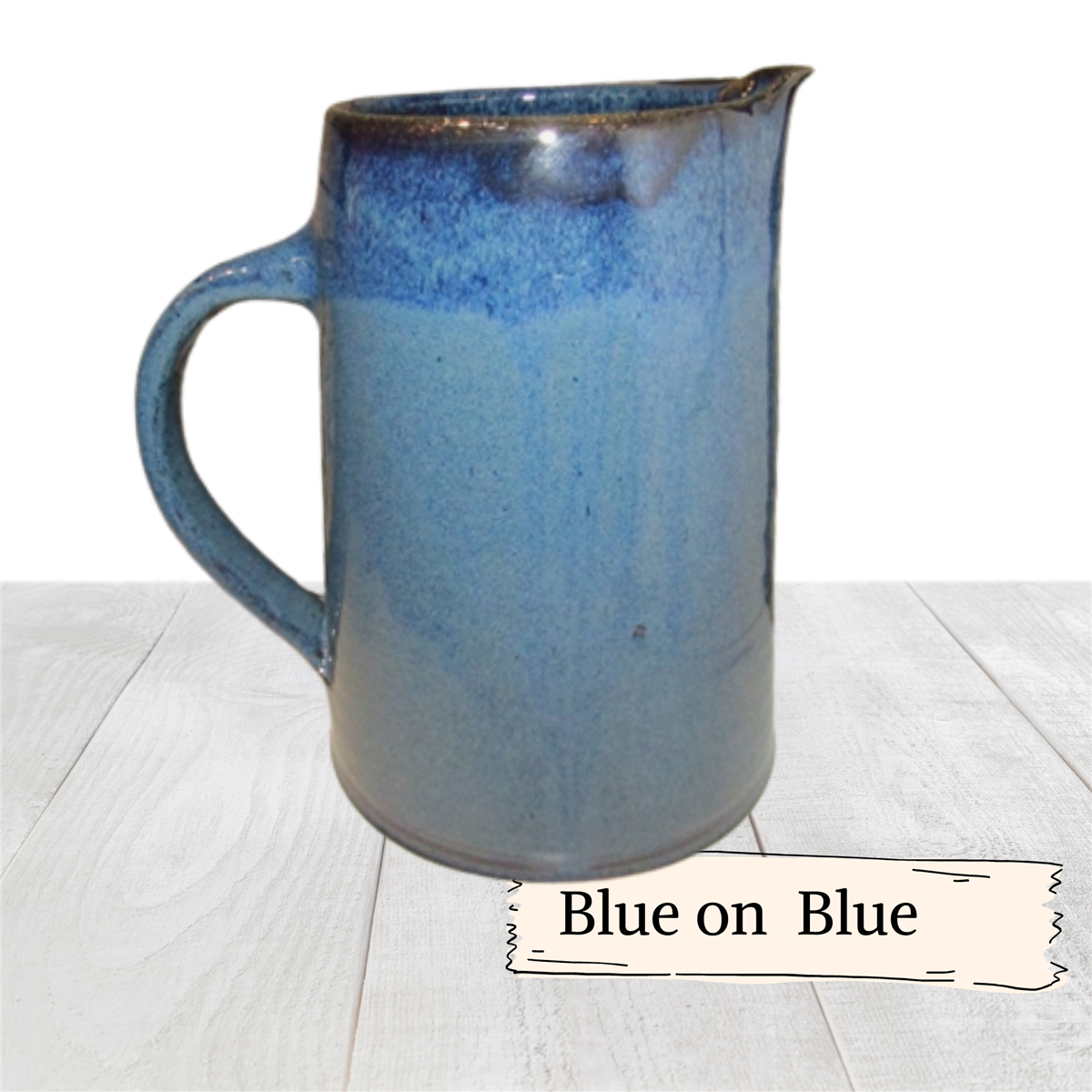 Large pottery pitcher with pour spout. Hot or cold liquids