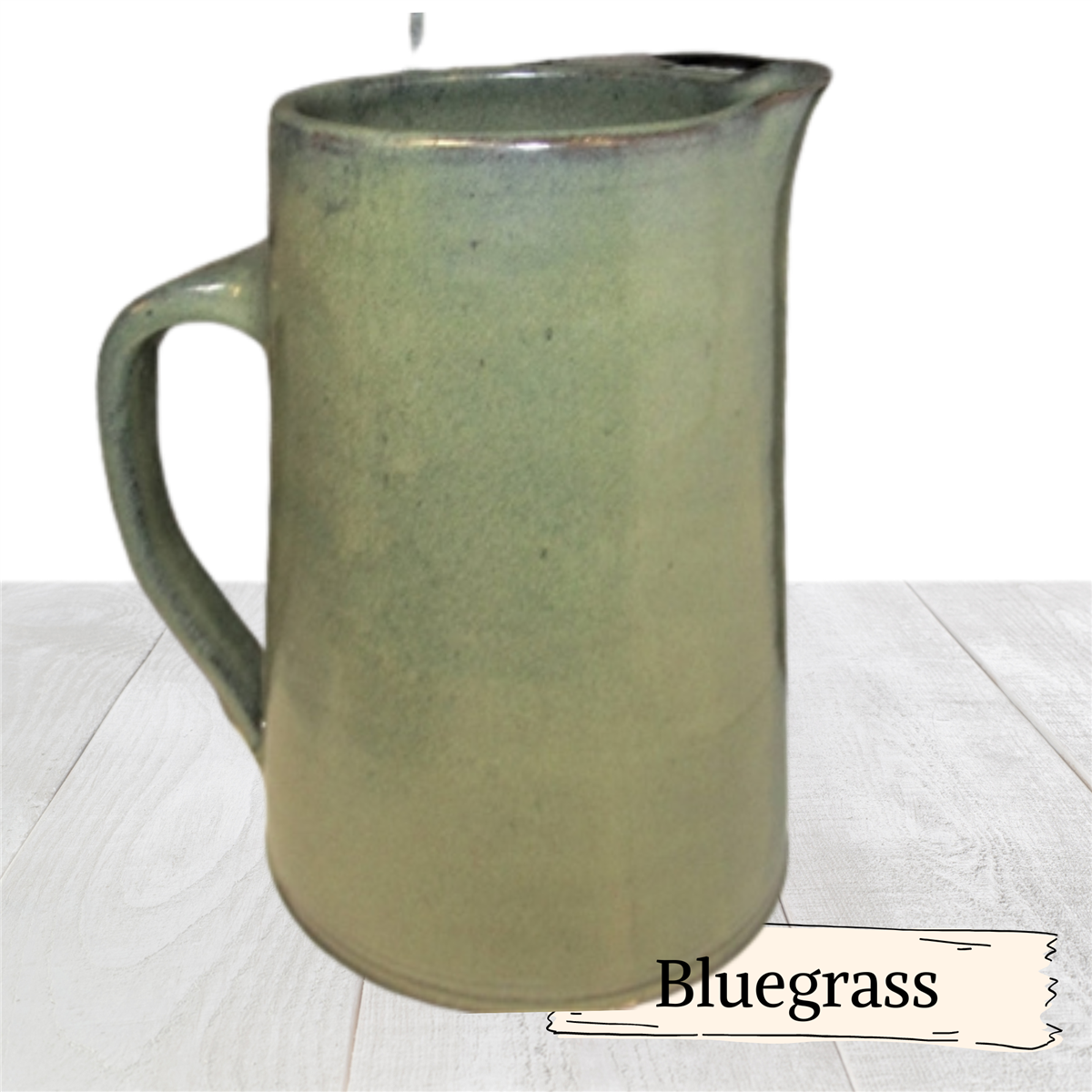 Large pottery pitcher with pour spout. Hot or cold liquids