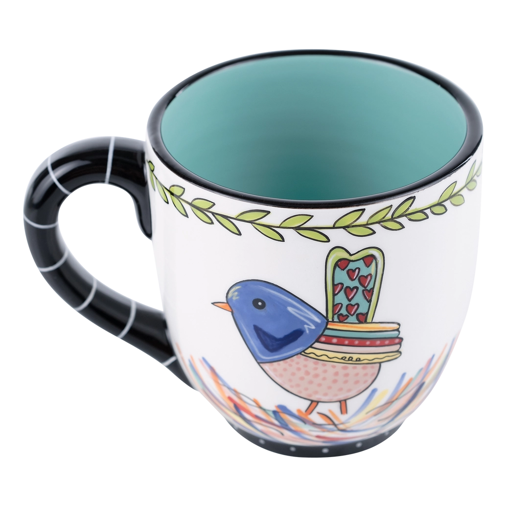Ceramic mug 16 ounce with cute blue bird on one side reads It is well with my soul. with heart on inside of mug