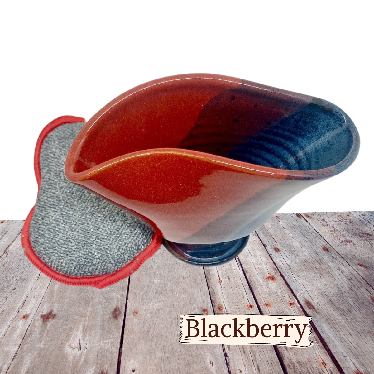 Scour scrubby pad holder for sink area. Pottery vase comes with a Euroscrubby