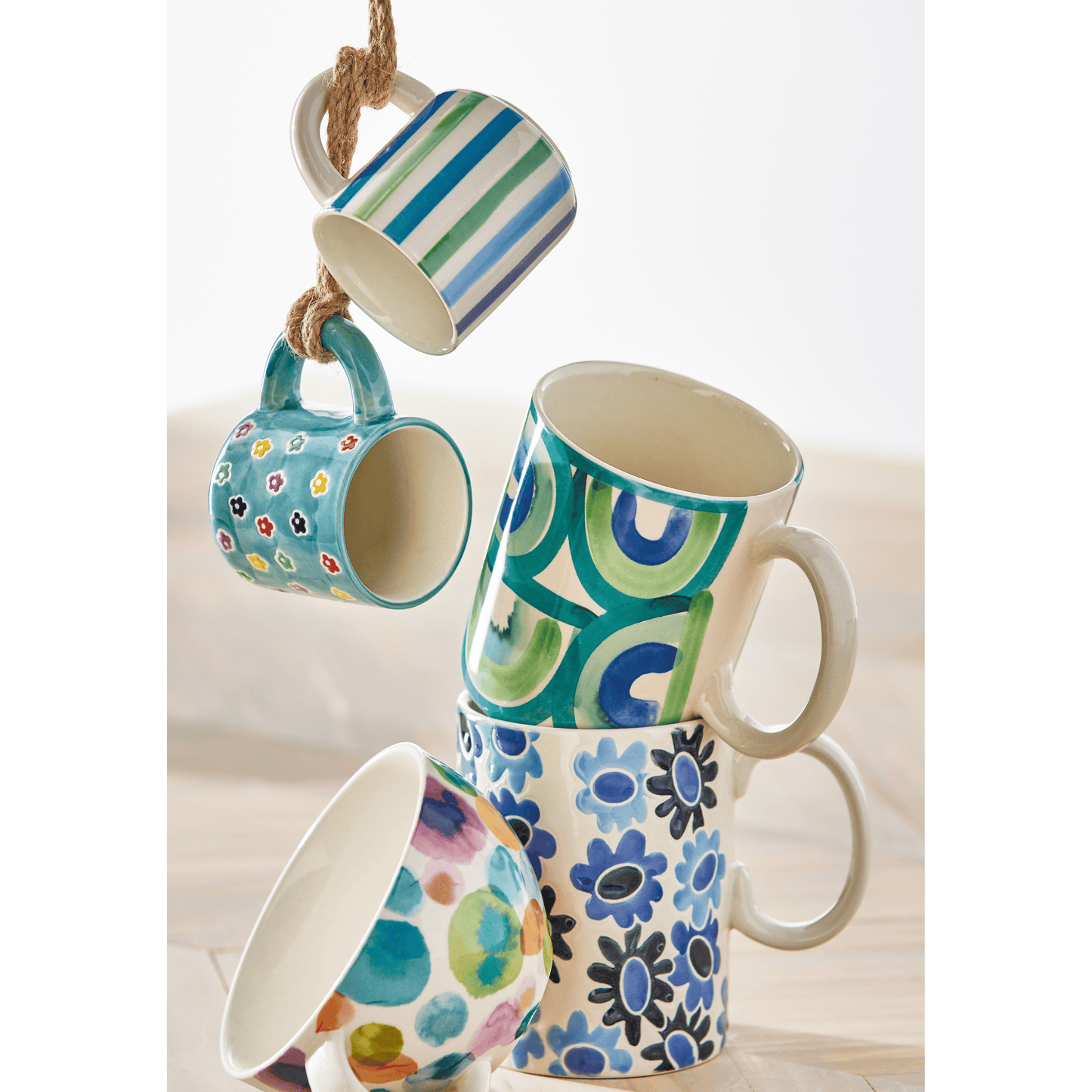 Flower Latte Mug Multi Stoneware by Tag. Green with Ditzy flower design