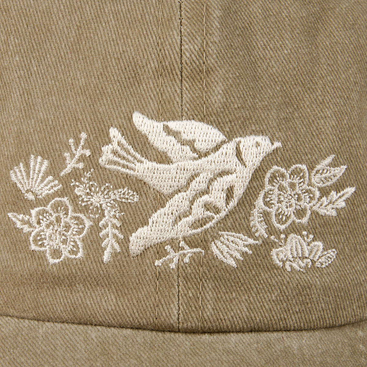 Peace Dove Baseball Cap tan with white embroidered front dove and floral design