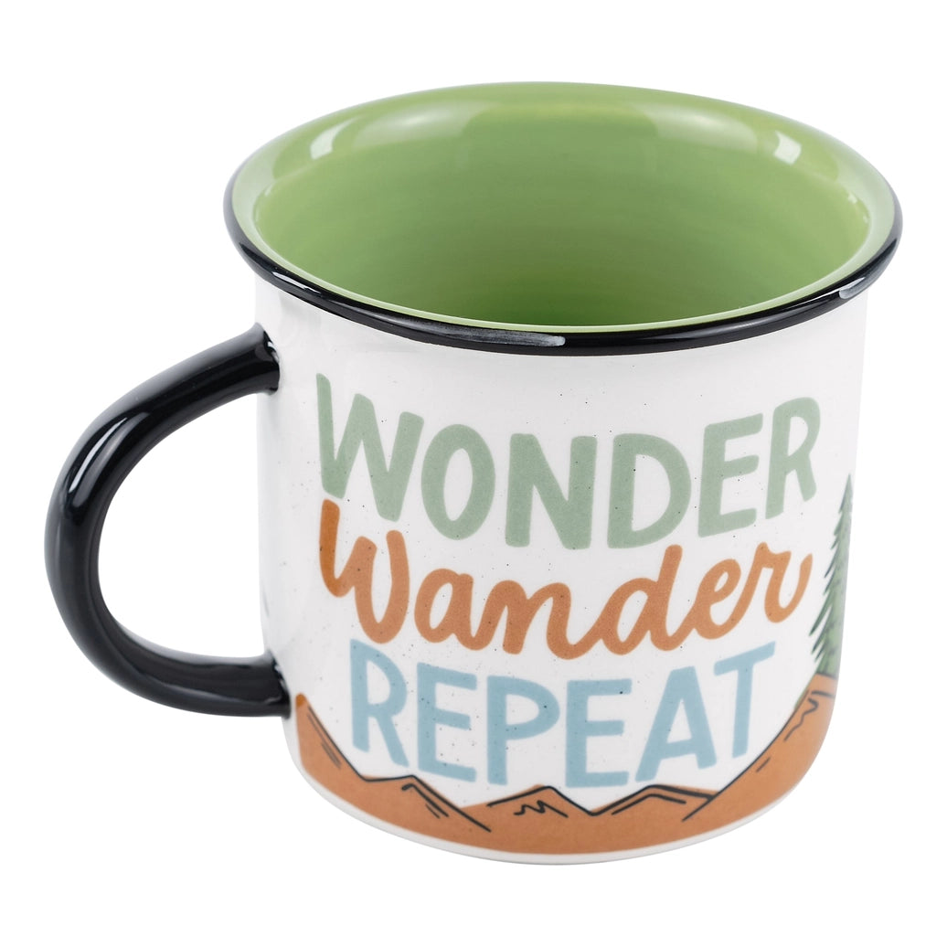 Ceramic mug 16 ounce with mountains reads Wander, Wonder, Repeat.