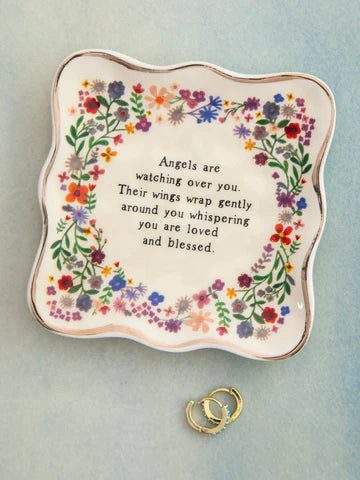 Angels watching you and wings wrapped around you. Ceramic dish with flowers.