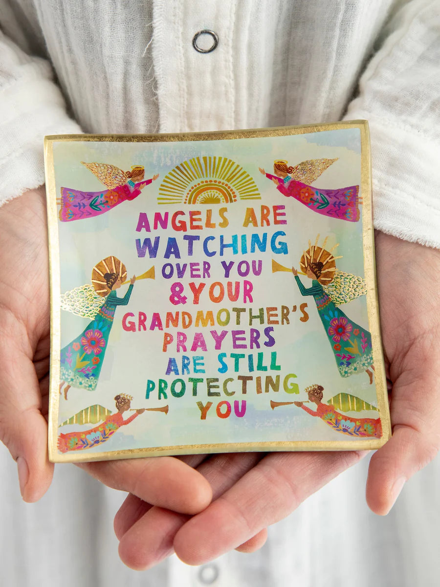 Glass tray with graphics.  Angels are watching you and Grandmother's prayers are still protecting you
