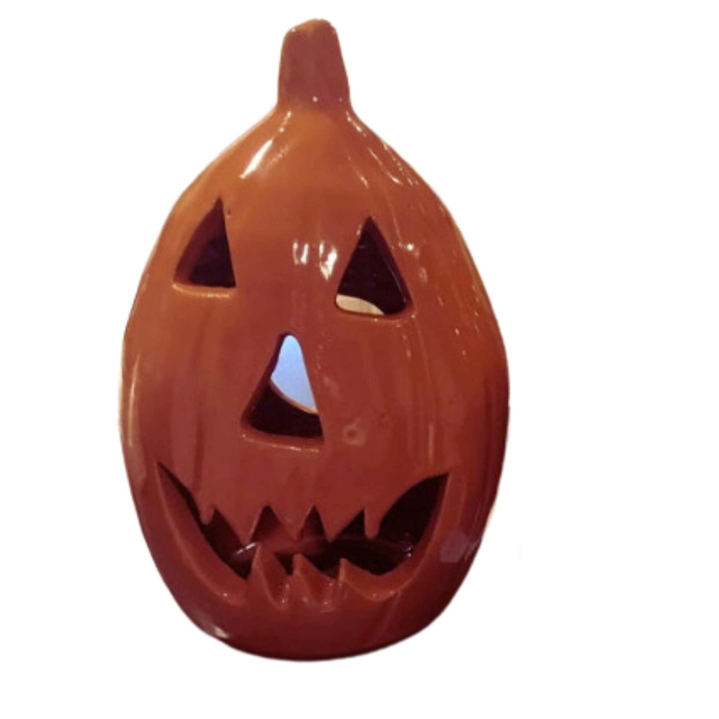 Jack o lantern happy cut out face for candle, battery or electric lights. Indoors or outdoor decor for Fall, Thanksgiving, and Halloween. Pottery lantern.