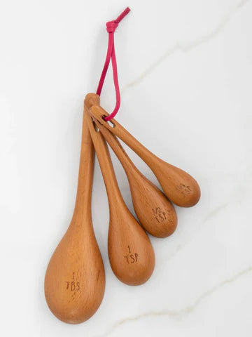 Measuring spoons set of 4 wooden with folk flower.  Tied together. Natural Life Brand