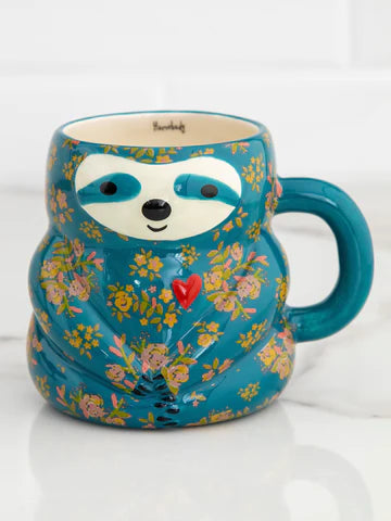 Sloth shaped ceramic mug by Natural Life. Homebody cup in turqoise color.