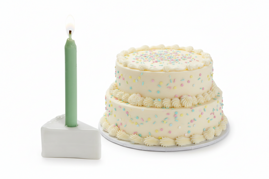 Porcelain slice of birthday cake that holds real candle. For Birthdays and suprises