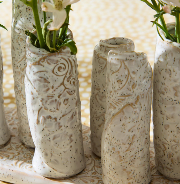 White washed embossed pattern multi vase with 9 sections on platform