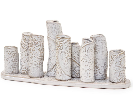 White washed embossed pattern multi vase with 9 sections on platform