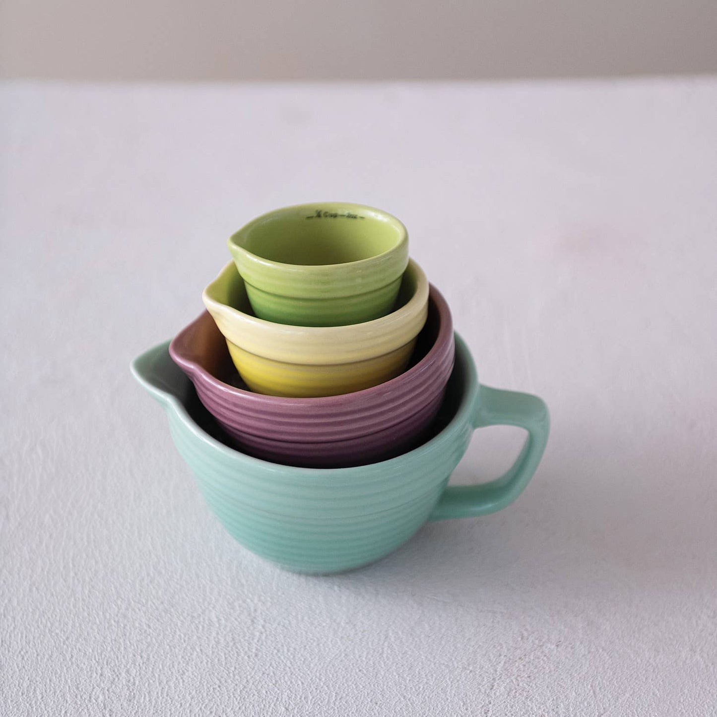 Stoneware nested measure cup set of 4. Fun colors Modern