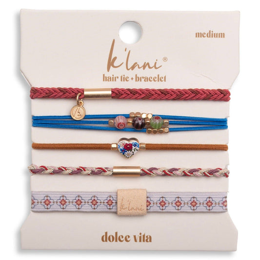 Set of colorful hair ties and bracelets on a 'K'lani' branded card.