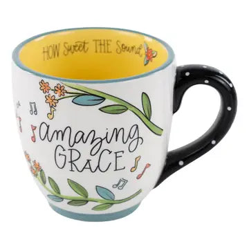 Ceramic mug 16 ounce with cute blue bird on one side reads Amazing Grace and How sweet the sound written on inside