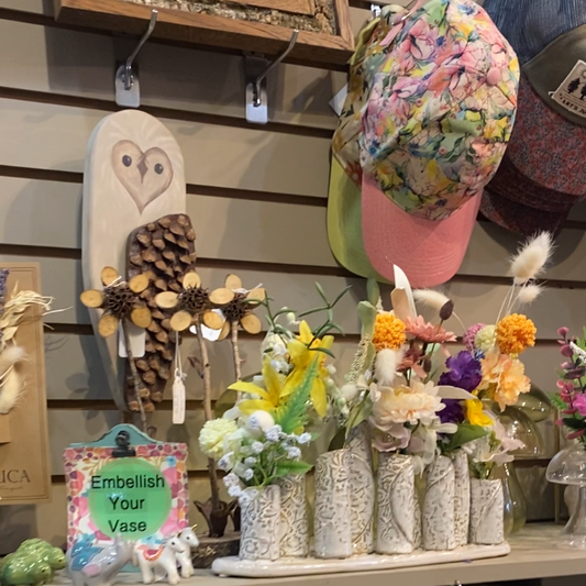 White washed embossed pattern multi vase with 9 sections on platform