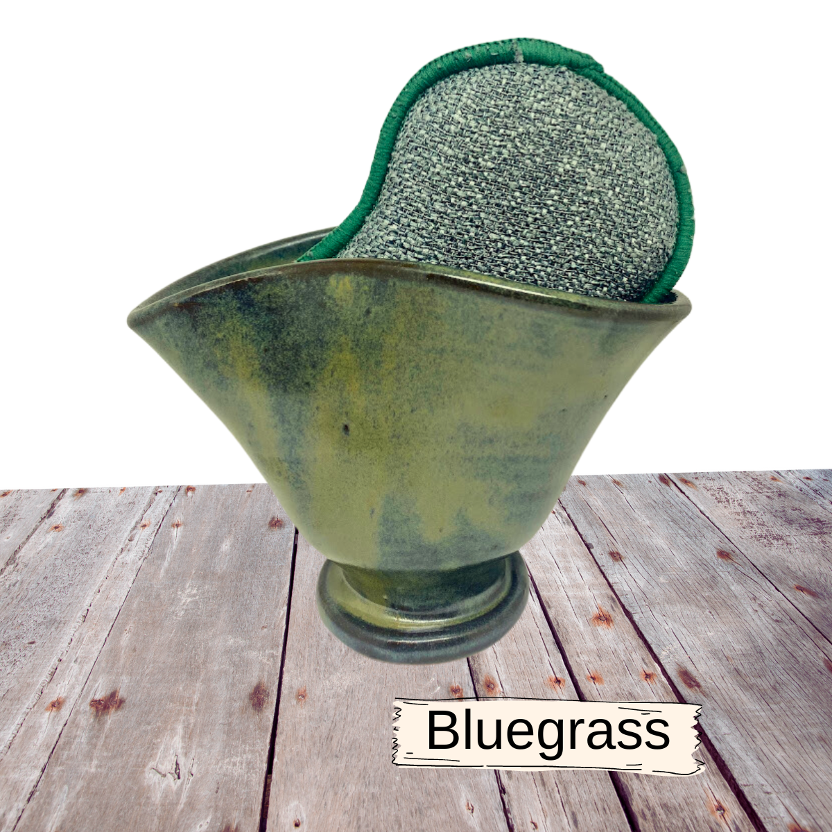 Scour scrubby pad holder for sink area. Pottery vase comes with a Euroscrubby