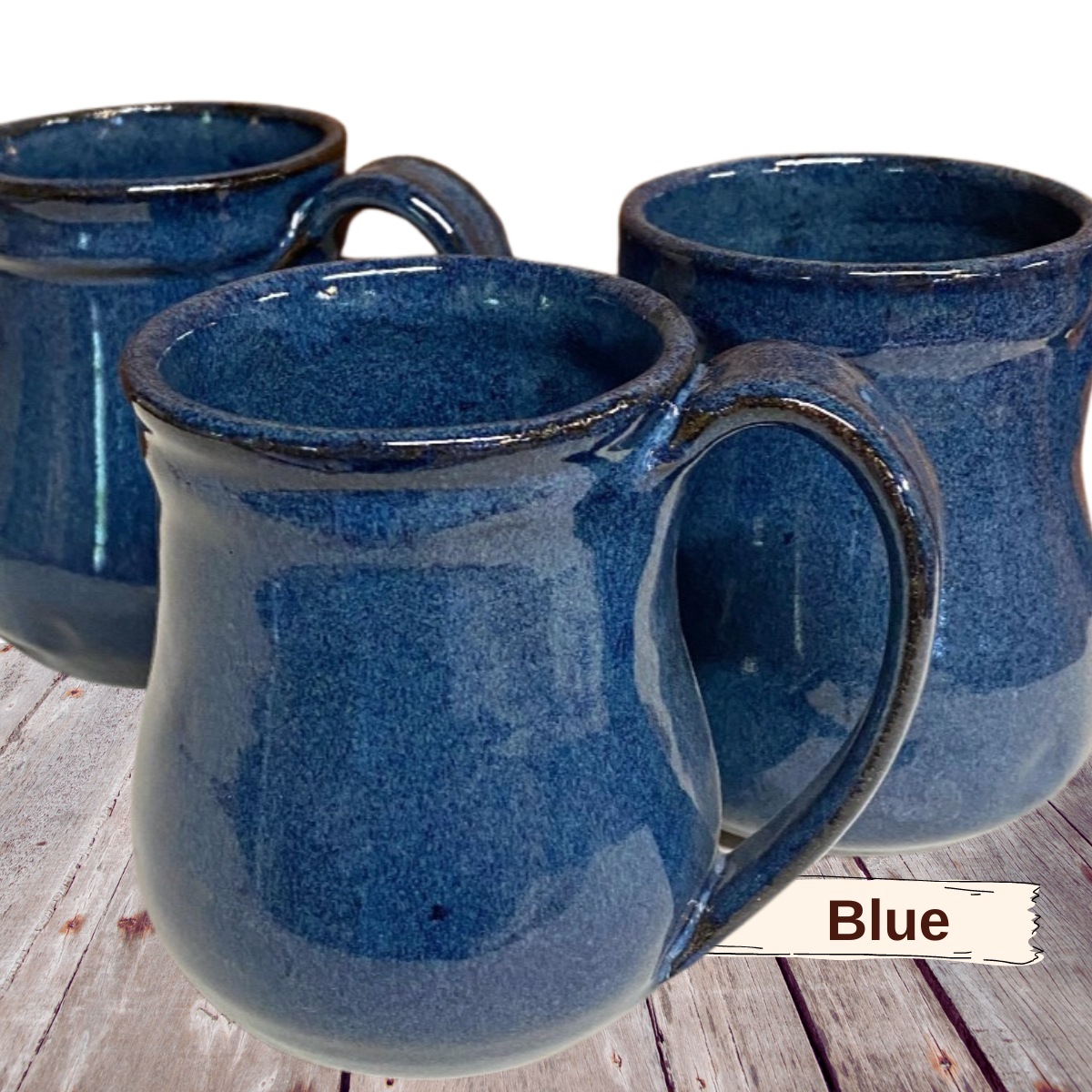 Coffee mug handmade pottery cup holds 12 ounces. Short ceramic tea cup