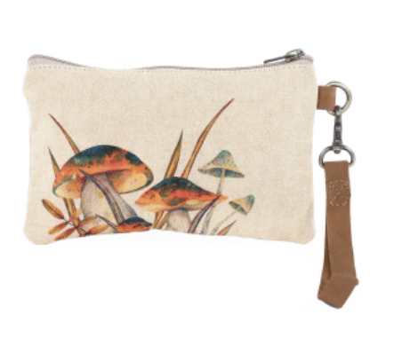 Canvas wristlet with mushrooms.  Lined on inside and real leather strap. Cotton canvas artwork on purse
