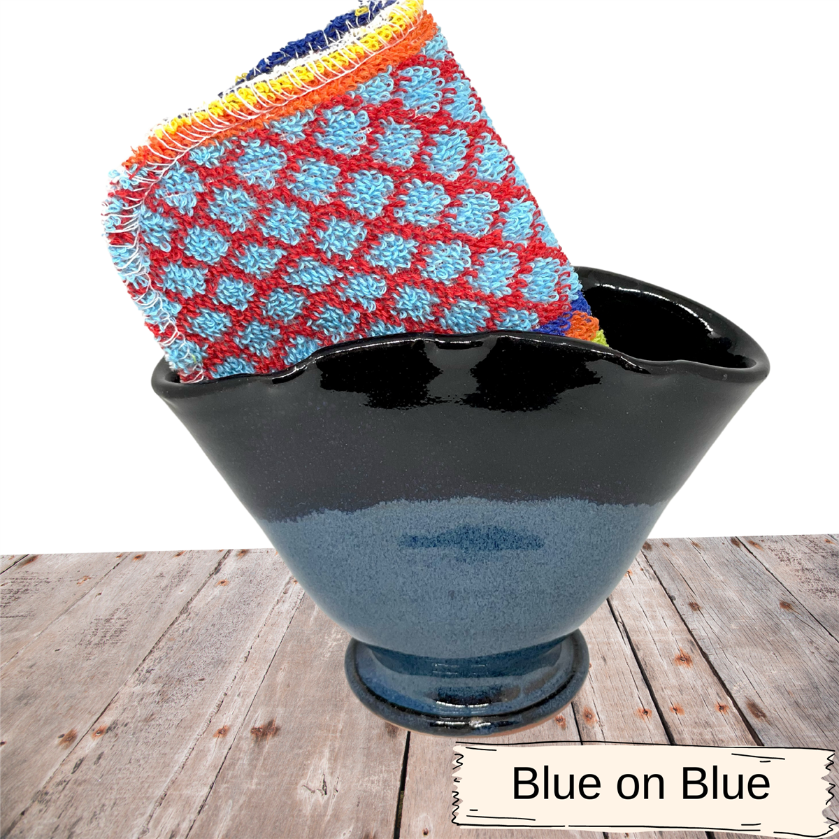 Scour scrubby pad holder for sink area. Pottery vase comes with a Euroscrubby