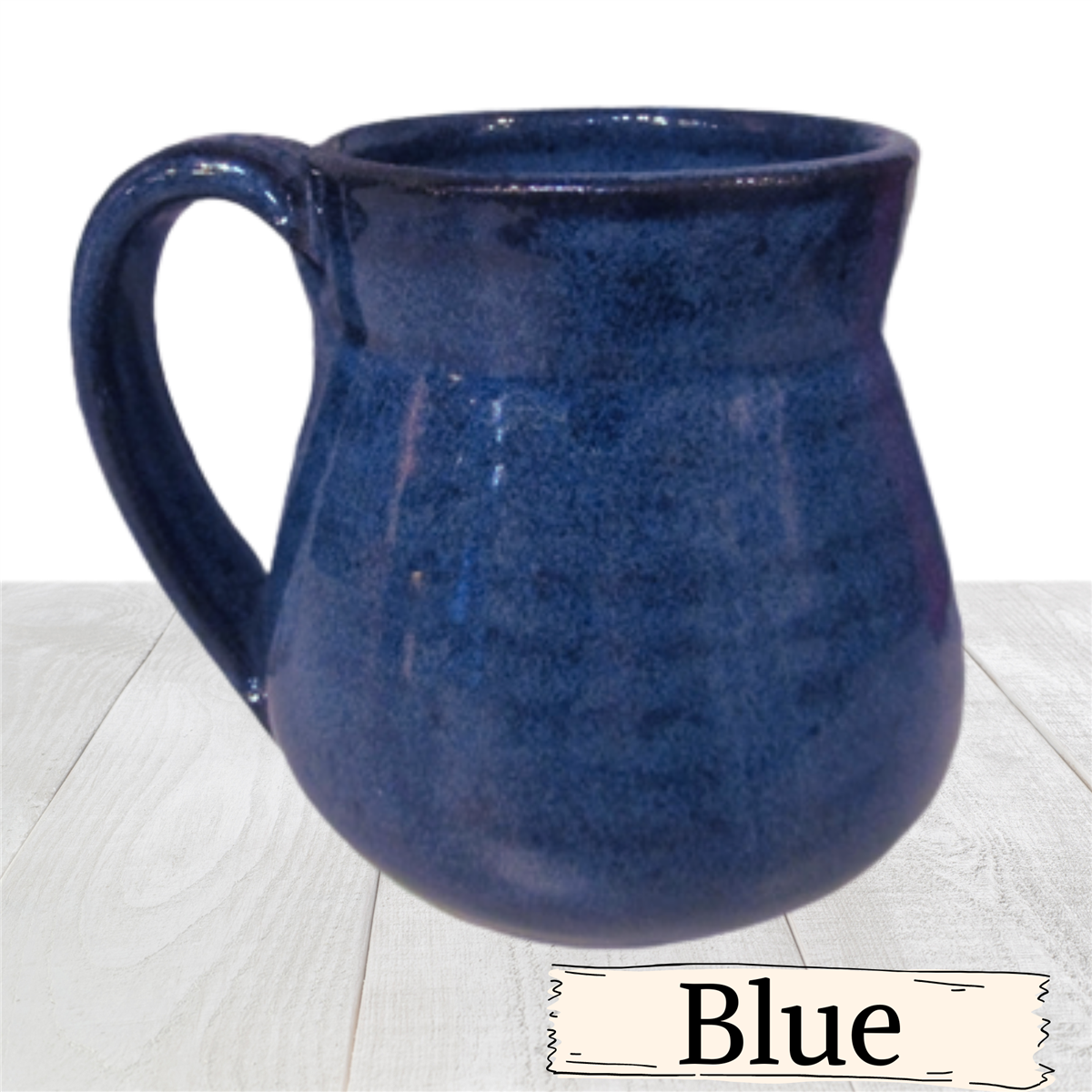 Coffee mug handmade pottery cup holds 12 ounces. Short ceramic tea cup