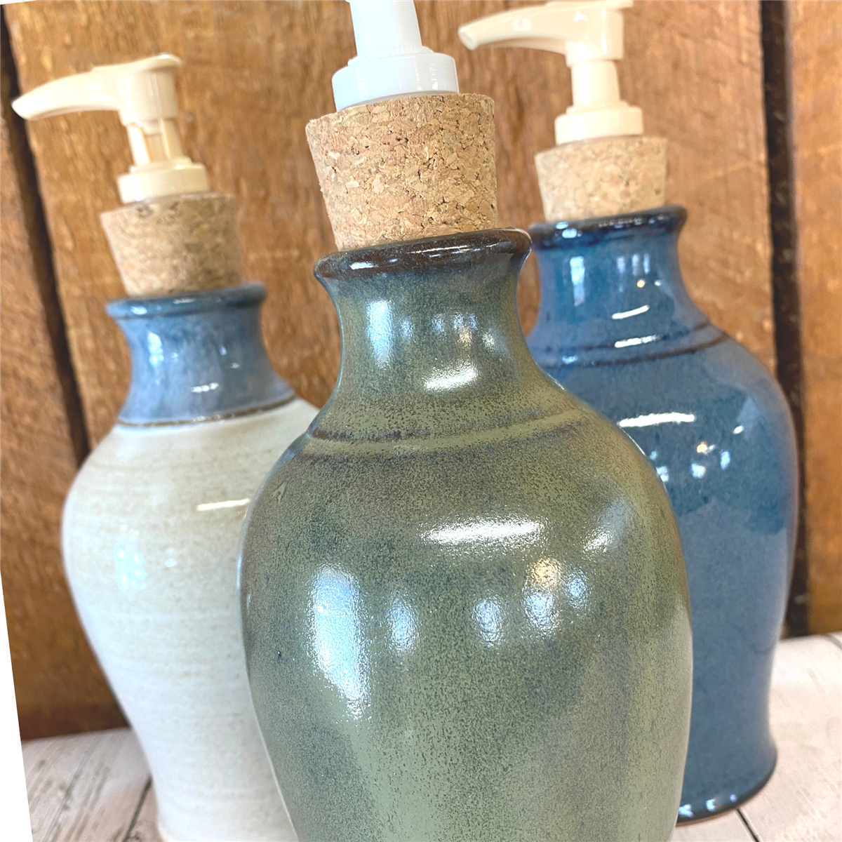 lotion, liquid soap dispenser pottery for dishwashing liquid. Handmade ceramic with cork and plastic pump