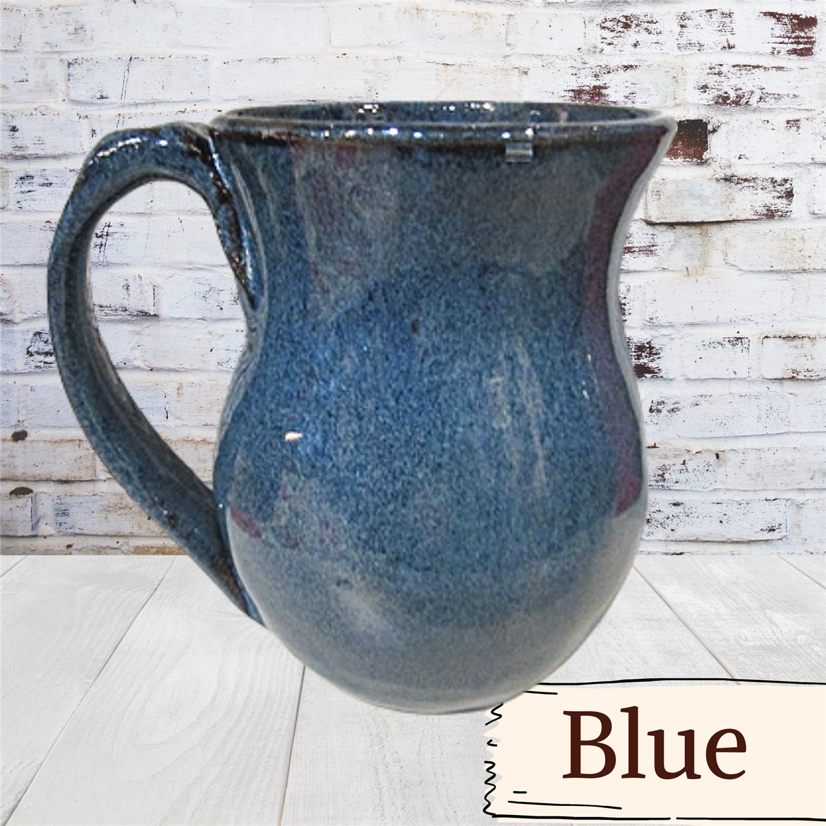 Coffee mug with thumb rest. Handmade pottery. Ceramic tea cup. 12 ounce mug