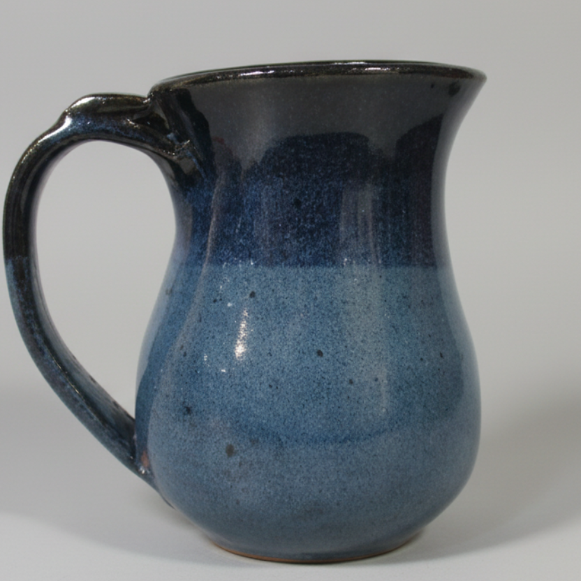 Coffee mug with thumb rest. Handmade pottery. Ceramic tea cup. 12 ounce mug