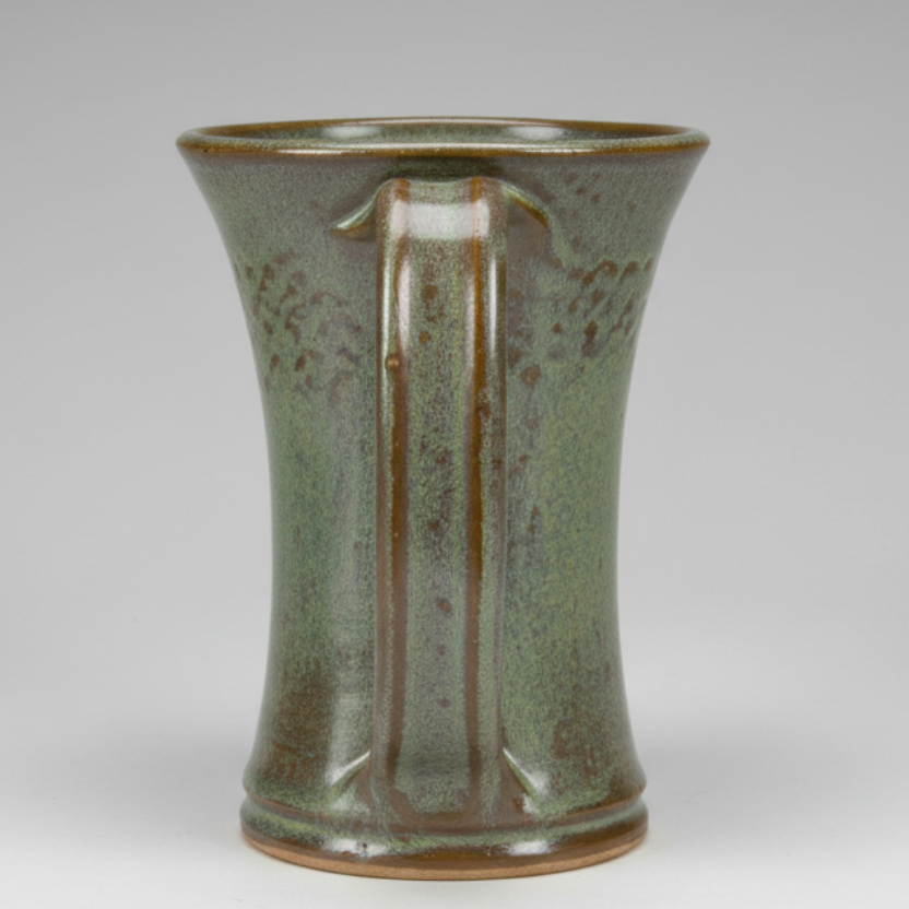 Coffee mug 12 ounces handmade with scroll design. Pottery tea cup