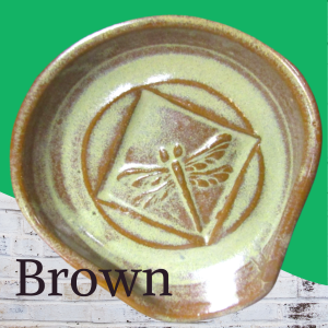 Ceramic spoon rest with dragonfly impressiom